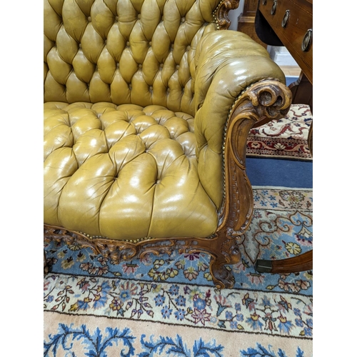 176 - A Louis XVI design settee upholstered in buttoned olive leather, length 190cm, depth 70cm, height 99... 