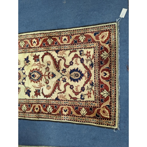 179 - An Uzbek style rug, 320 x 84cm