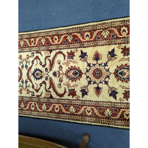 179 - An Uzbek style rug, 320 x 84cm