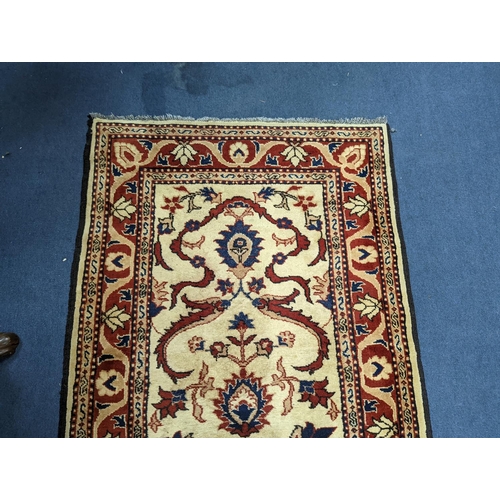 179 - An Uzbek style rug, 320 x 84cm