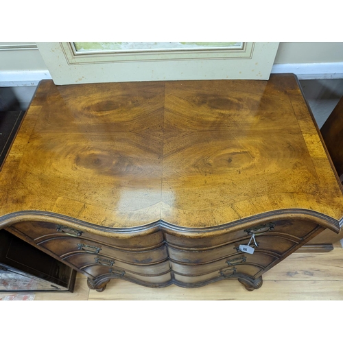 185 - A 1920's Queen Anne revival banded walnut shaped front chest, width 76cm, depth 46cm, height 85cm... 