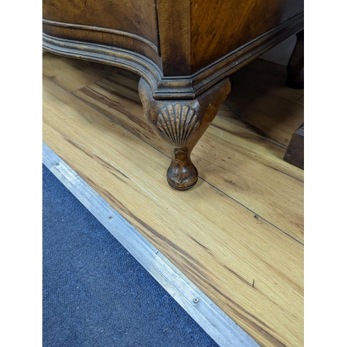 185 - A 1920's Queen Anne revival banded walnut shaped front chest, width 76cm, depth 46cm, height 85cm... 