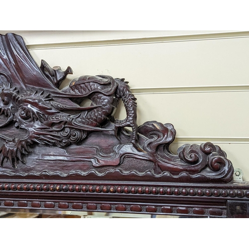 193 - A Japanese carved hardwood dragon overmantel mirror, width 112cm, height 180cm