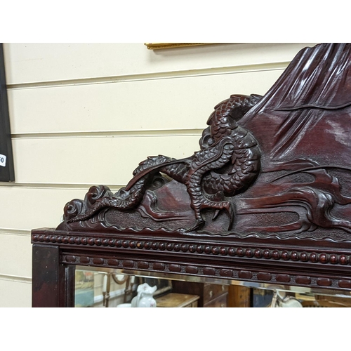 193 - A Japanese carved hardwood dragon overmantel mirror, width 112cm, height 180cm