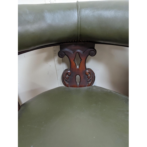 195 - A Victorian mahogany tub framed chair upholstered in green leather, width 60cm, depth 58cm, height 6... 