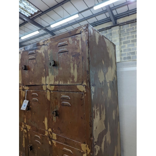 20 - An industrial style metal locker unit. W-91cm, D-49cm, H-198cm.