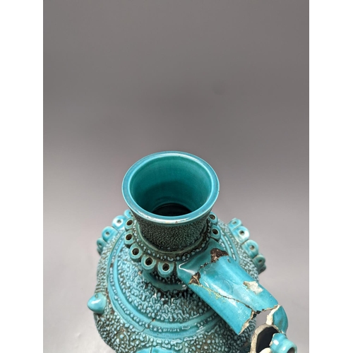 251 - A Zsolnay turquoise glazed ewer (a.f.) 30cm