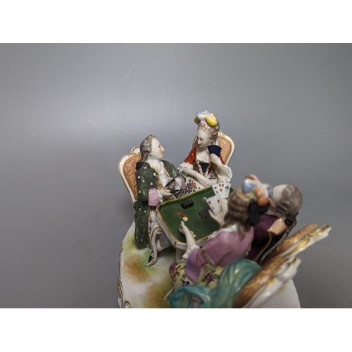 256 - A German porcelain group of figures at a games table 21cm