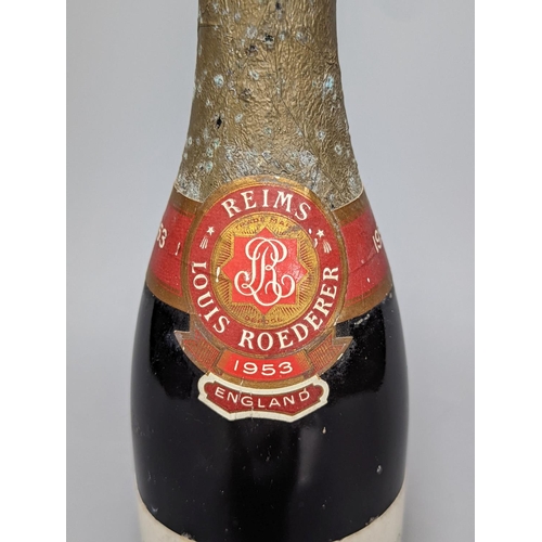 257 - One half bottle of 1953 Louis Roederer extra dry champagne