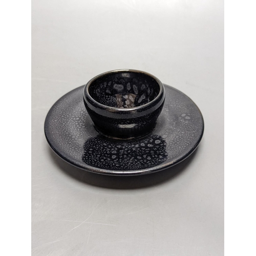 260 - A Chinese oil spot glazed cup with integral stand and a black glazed  resist pottery vase, 18cm... 