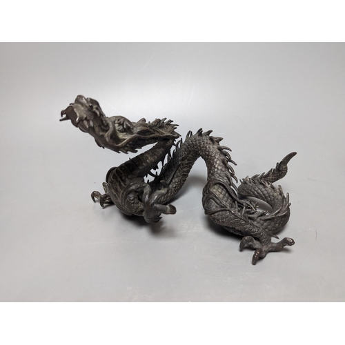 269 - A pair of early 20th century Japanese bronze figures of dragons 22cm