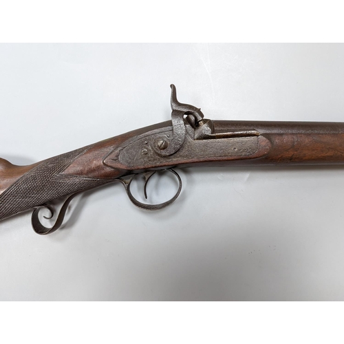 278 - A late 19th/early 20th century percussion cap musket,115 cms long.