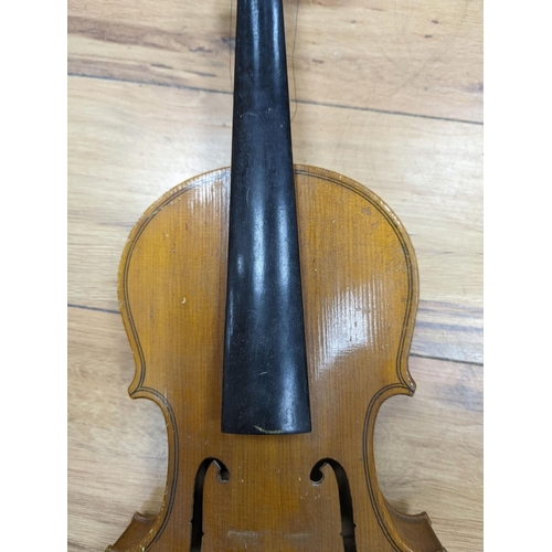 282 - A violin and bow, various records etc