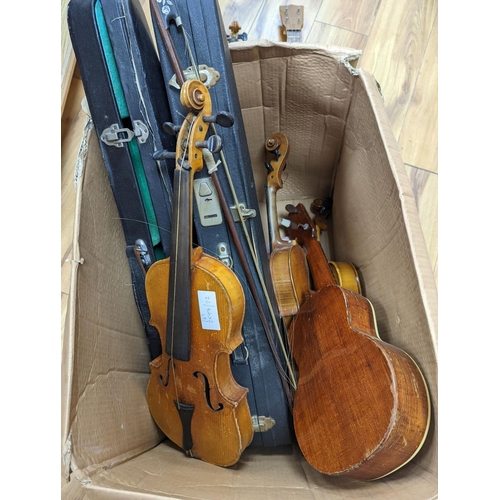 287 - Four 3/4, half and quarter size violins and two ukuleles.