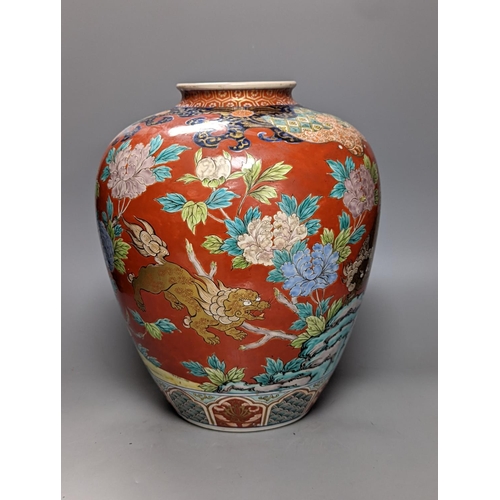 298 - A large Japanese Kutani ovoid vase, painted with Buddhist Lions 36cm