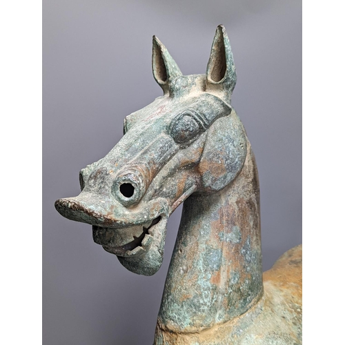 300 - A large Chinese bronze figure of a horse, Han style 58cm