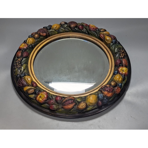 304 - A Barbola circular mirror 46cm