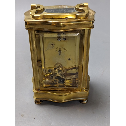 325 - A brass cased carriage timepiece