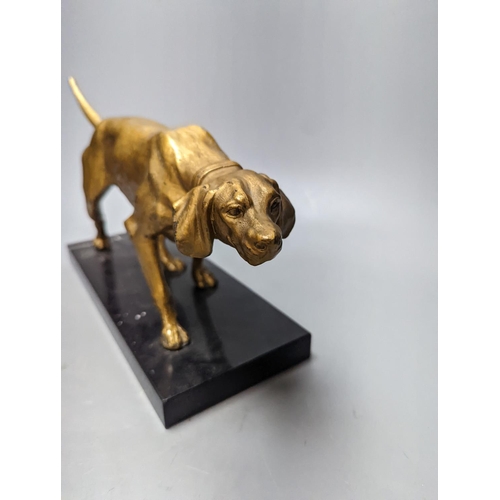 327 - A gilt-metal model of a pointer on marble base 29cm