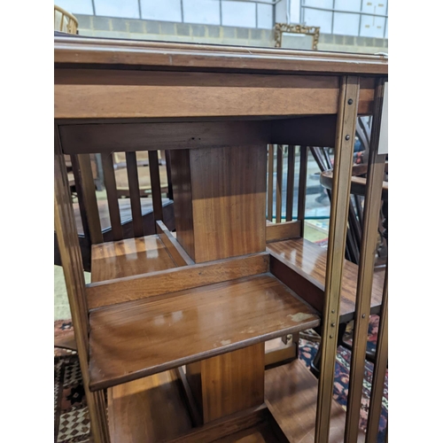 33 - An Edwardian inlaid satinwood revolving bookcase, width 48cm, depth 47cm, height 85cm