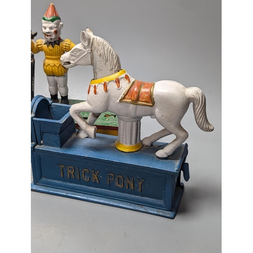 331 - Two painted cast iron money banks ‘Trick Dog’ and ‘Trick Pony’, and a serpentine bathtub... 