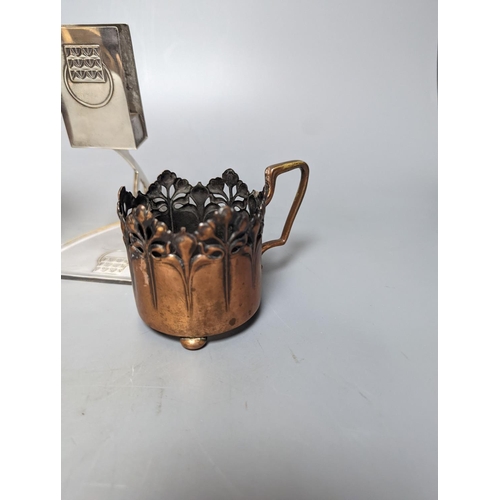 333 - A pair of early WMF copper cup holders, pewter cup holder and a WMF matchbox holder