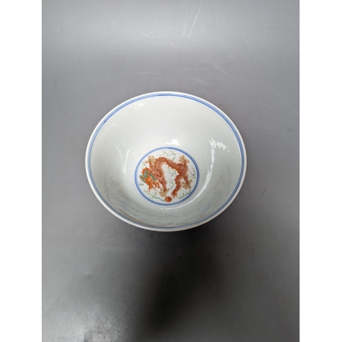 334 - A Wucai bowl, dragon and flamingo pearl decoration, Jiaqing mark, on wood stand. 16cm diameter... 