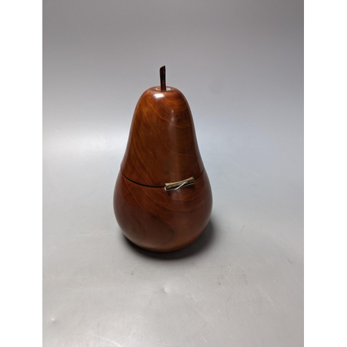 336 - A George III style fruitwood pear shaped tea caddy, 21 cms high.