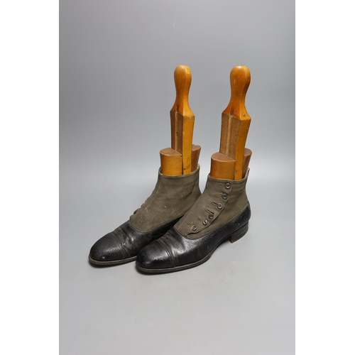 379 - A pair of 19th century buttoned boots, a pair of spats, a red silk jockey's cap, a pair of spurs and... 