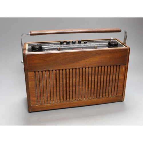 389 - A Dynatron Atlantis portable radio, 33 cms high.