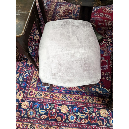 4 - A Victorian mahogany upholstered footstool. H-47cm