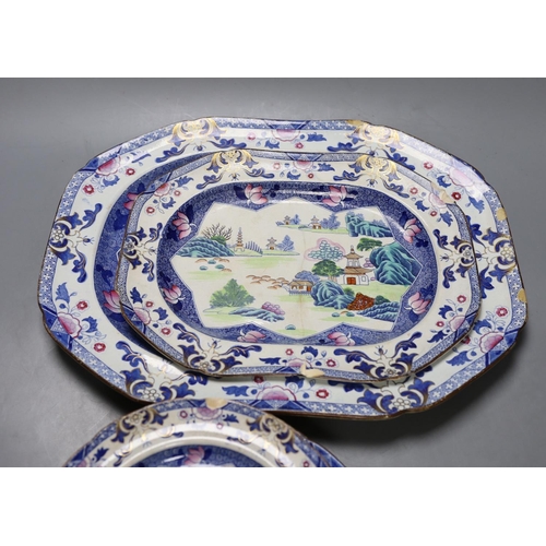 426 - Eight pieces of early 19th century stone china dinnerware, including two graduated meat dishes (some... 