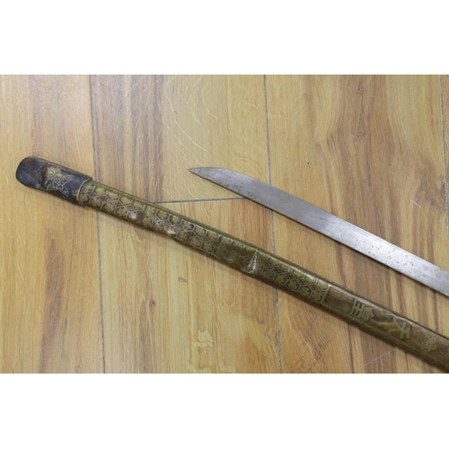 434 - A Chinese sword, single edged blade 64cm, in etched brass scabbard