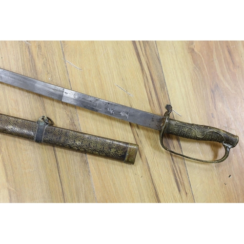 434 - A Chinese sword, single edged blade 64cm, in etched brass scabbard