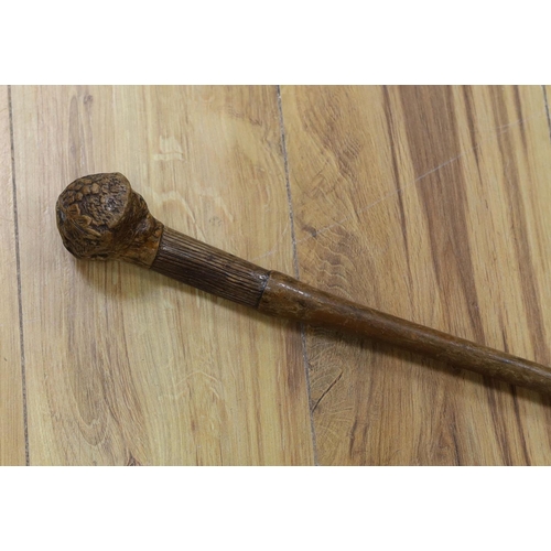 435 - A 19th century folk art walking stick, 89 cms long.