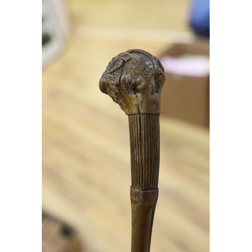 435 - A 19th century folk art walking stick, 89 cms long.