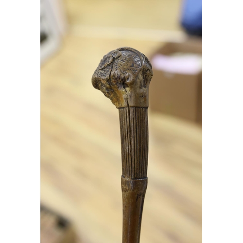 435 - A 19th century folk art walking stick, 89 cms long.