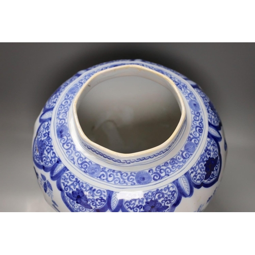 448 - A large blue and white Delft vase, 44 cms high.