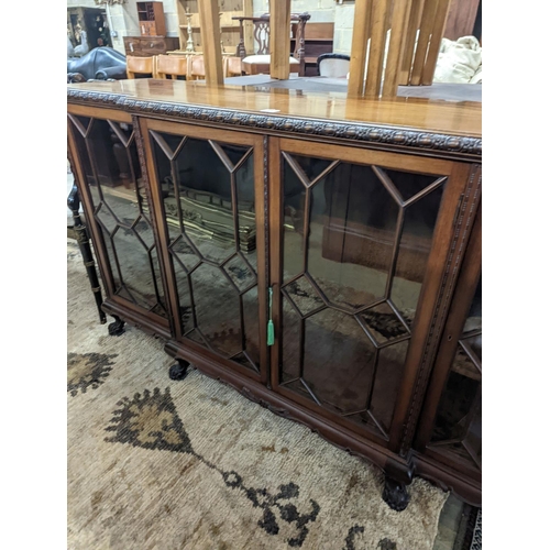 45 - A 1920's Chippendale revival glazed mahogany break front dwarf cabinet, width 160cm, depth 43m, heig... 