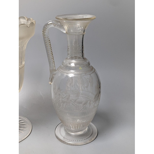 480 - A Victorian wheel engraved ewer,with quinine scenes after the antique, 26 cms high, including 3 cele... 