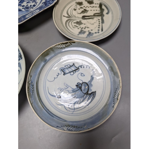 486 - An 18th century Chinese export blue and white meat platter, 38 cms wide, and other Oriental tablewar... 