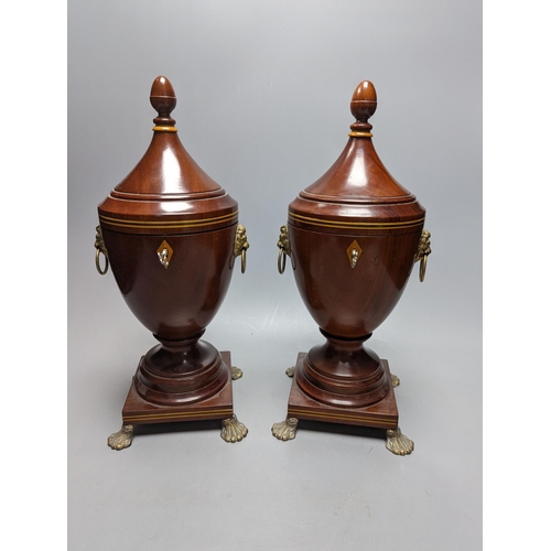 494 - A pair of Sheraton-style mahogany urn-shape tea caddies, with brass mounts, 36cm.