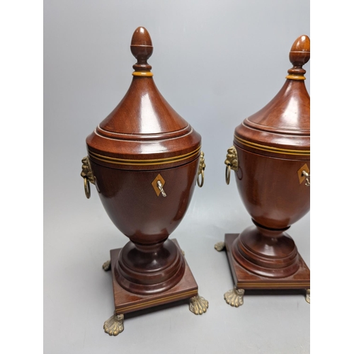 494 - A pair of Sheraton-style mahogany urn-shape tea caddies, with brass mounts, 36cm.