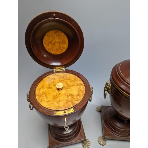 494 - A pair of Sheraton-style mahogany urn-shape tea caddies, with brass mounts, 36cm.