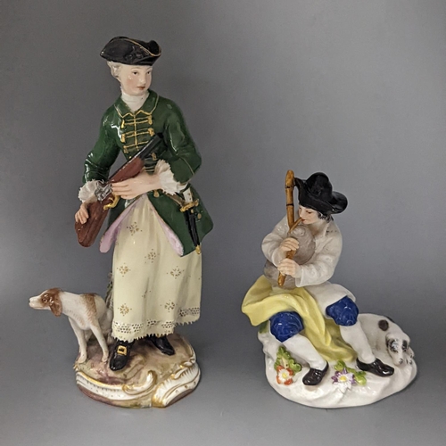 498 - A Meissen figure of a seated man playing the bagpipes, 8.5cm., and a similar group  of a huntswoman ... 