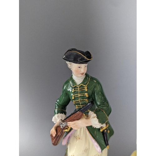 498 - A Meissen figure of a seated man playing the bagpipes, 8.5cm., and a similar group  of a huntswoman ... 