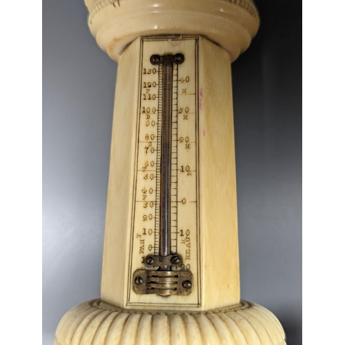 499 - A 19th century ivory table thermometer, 13cm.