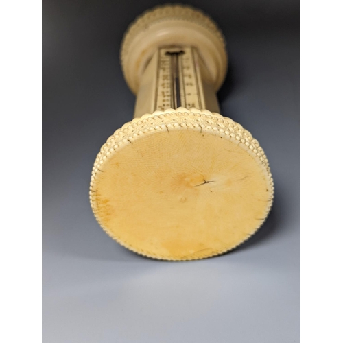 499 - A 19th century ivory table thermometer, 13cm.