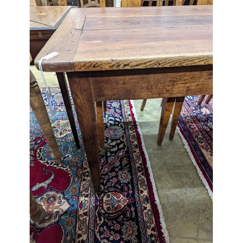 5 - A 19th century French rectangular oak kitchen table. W-153cm, D-75cm, H-73cm.