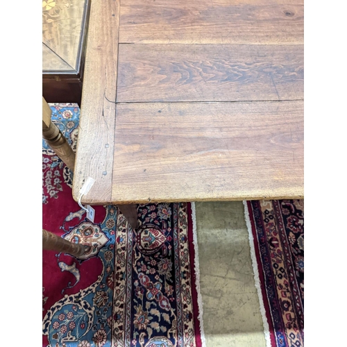 5 - A 19th century French rectangular oak kitchen table. W-153cm, D-75cm, H-73cm.